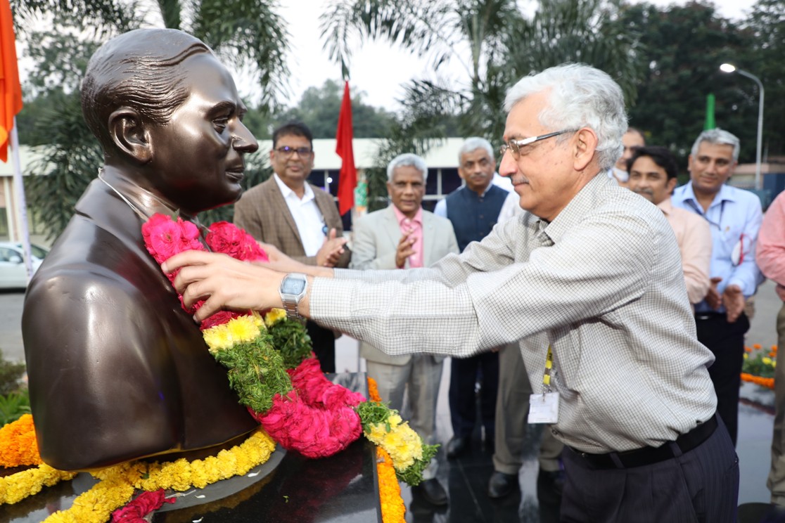 Garlanding the bust of Dr. Homi J Bhabha by Shri KN Vyas, Chairman, AEC & Secretary DAE.