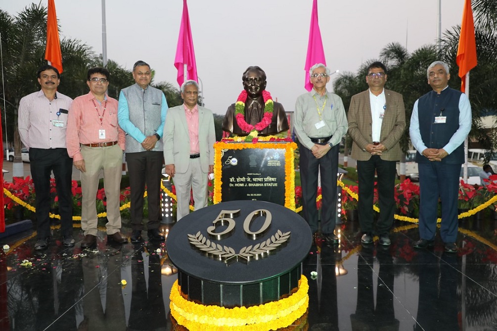 Dignitaries at the bust of Dr. Homi J Bhabha.