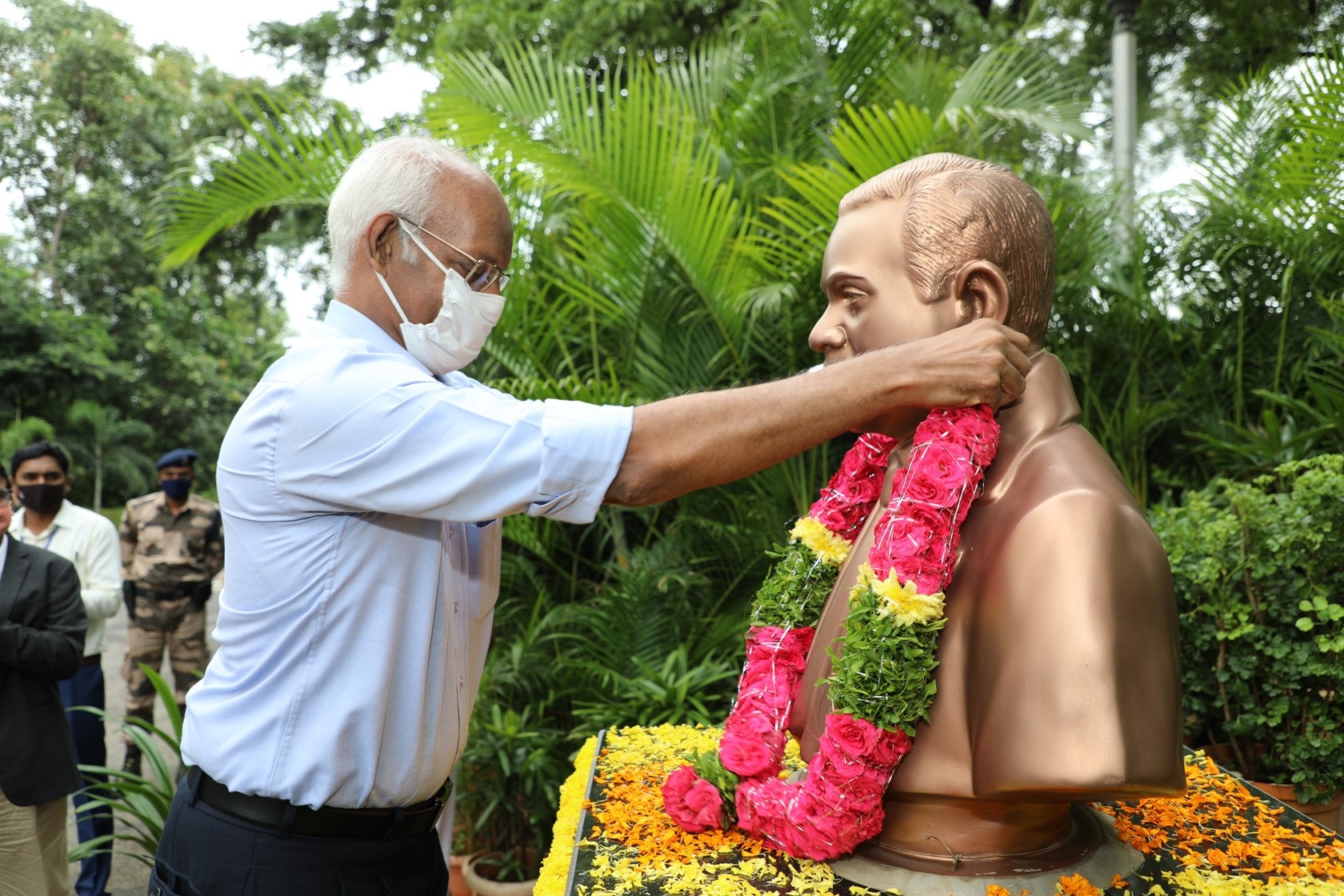 Shri N. Prabhakar, Son garlanding the bust of Dr.N. Kondal Rao.
