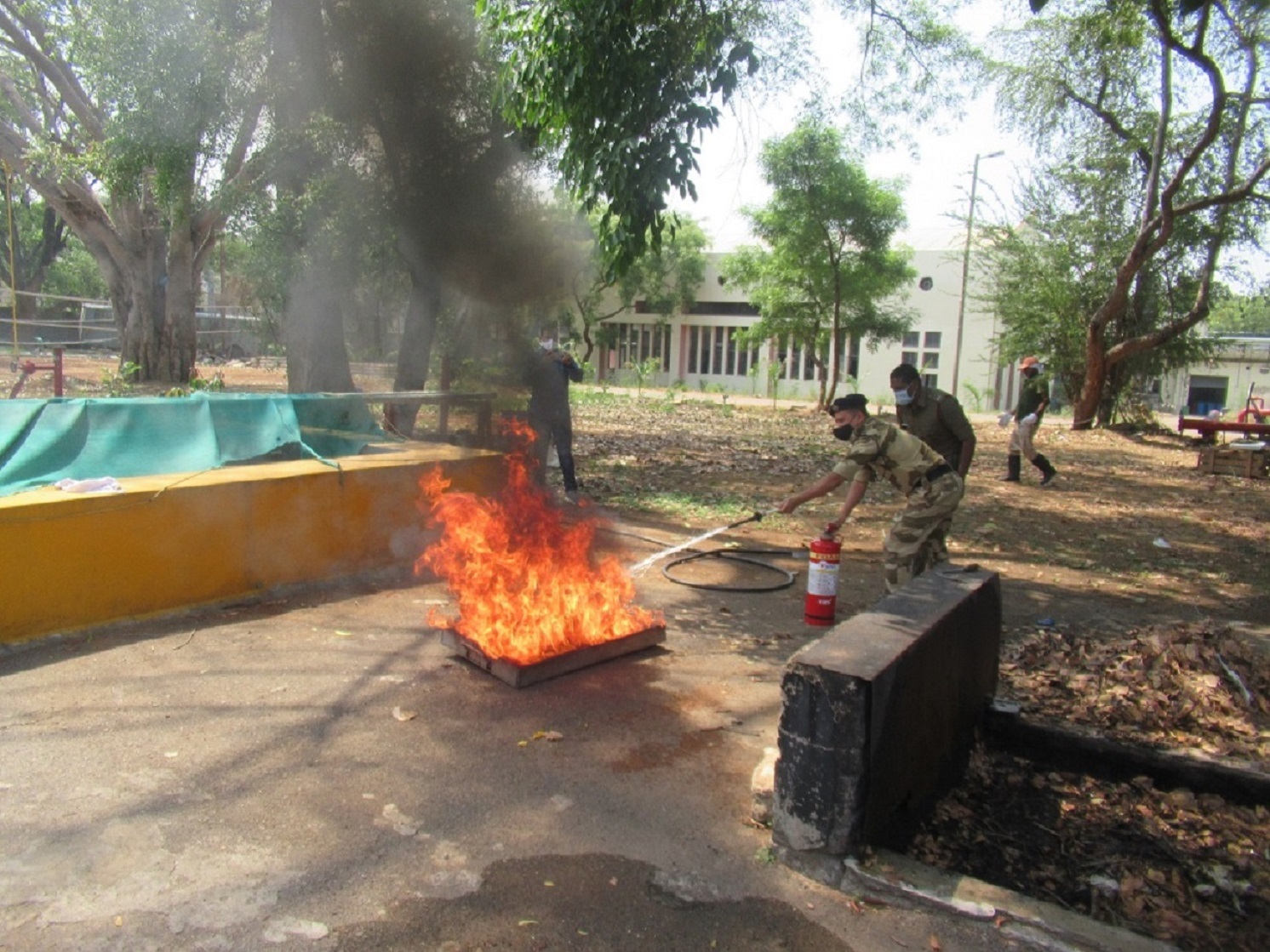 Extinguisher operation training to personnel of Central Industrial Security Force during National Fire Service Week.