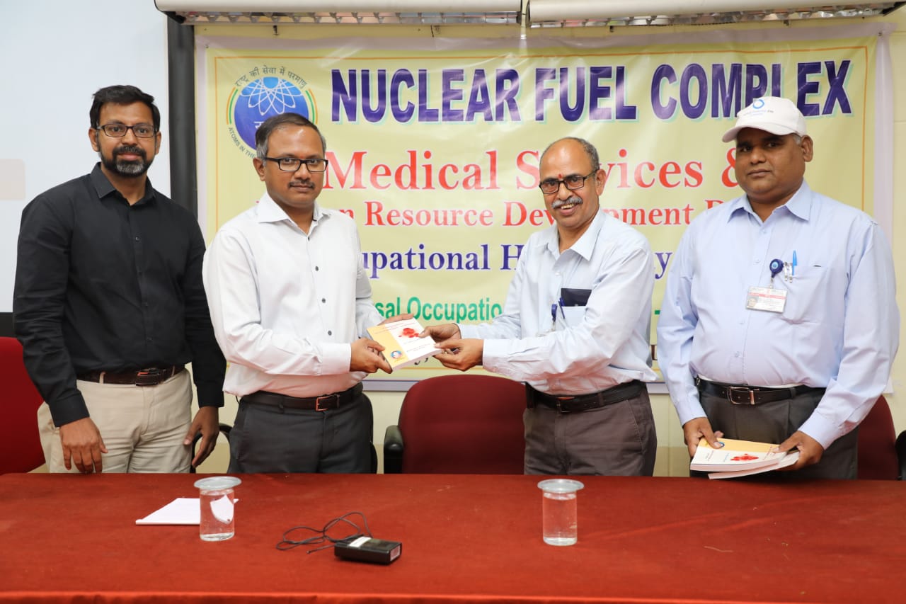 Dr.Ratnakar Rao, Consultant Oncologist receiving a book from Chief Guest.