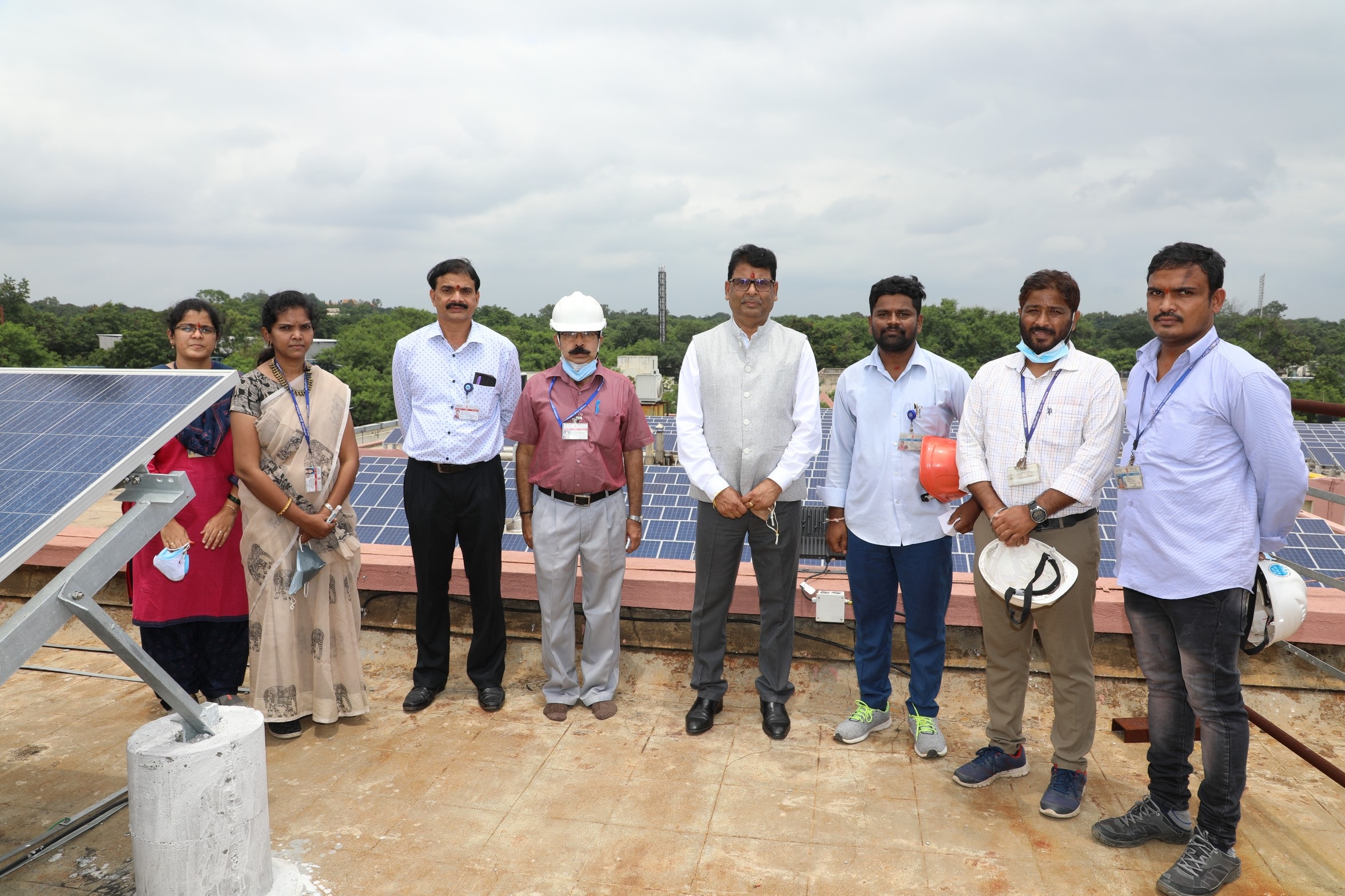 CE, NFC with the team involved in the work.