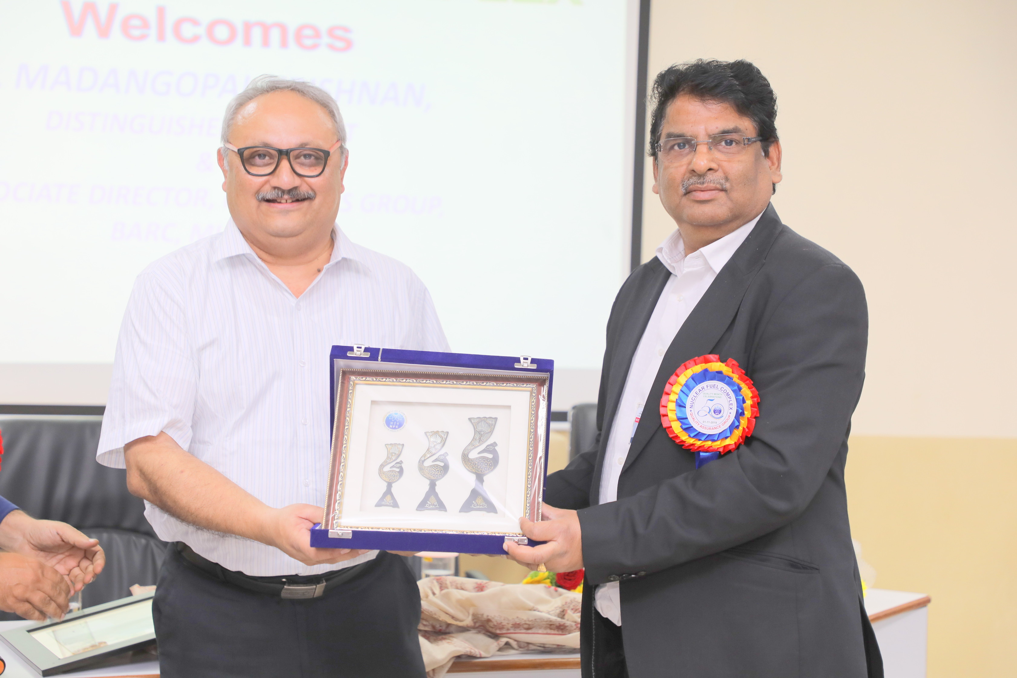 Presenting Momento to Dr Madan Gopal Krishnan, Distinguished Scientist & Associate Director, Materials Group, BARC.