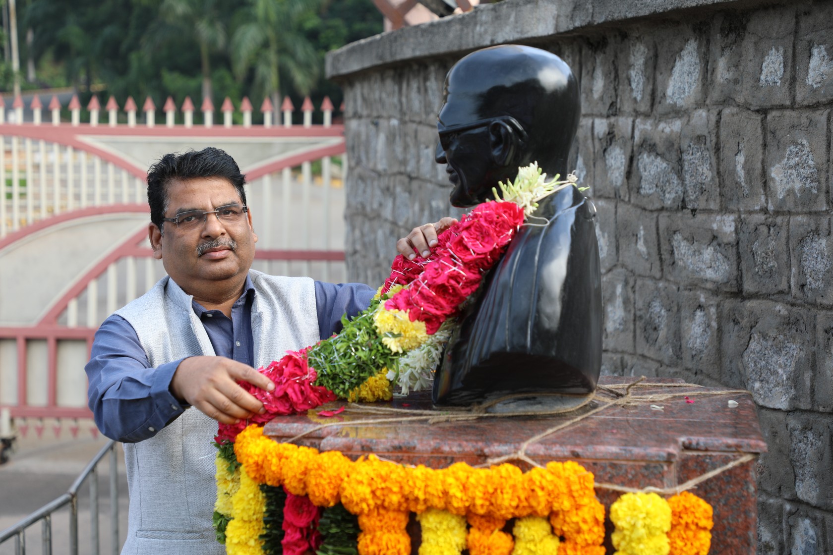 Garlanding Mahatma Gandhi by Dr. Dinesh Srivastava, CE, NFC