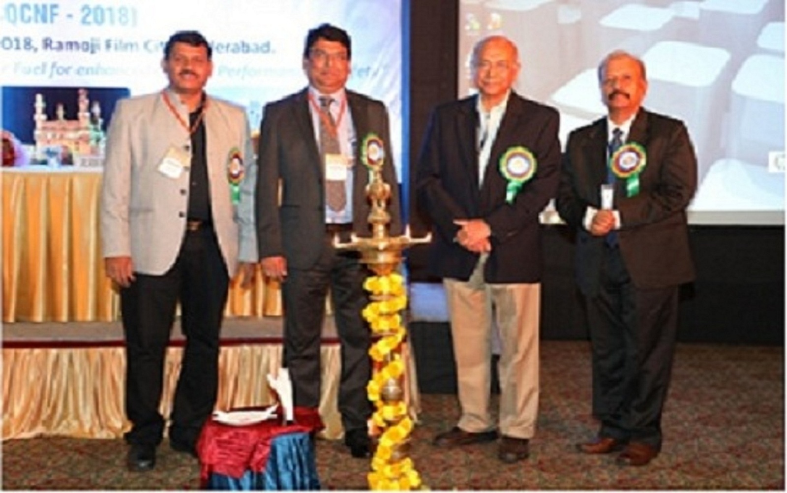Lighting of the Lamp by Dignitaries during the Inaugural Programme of the Conference