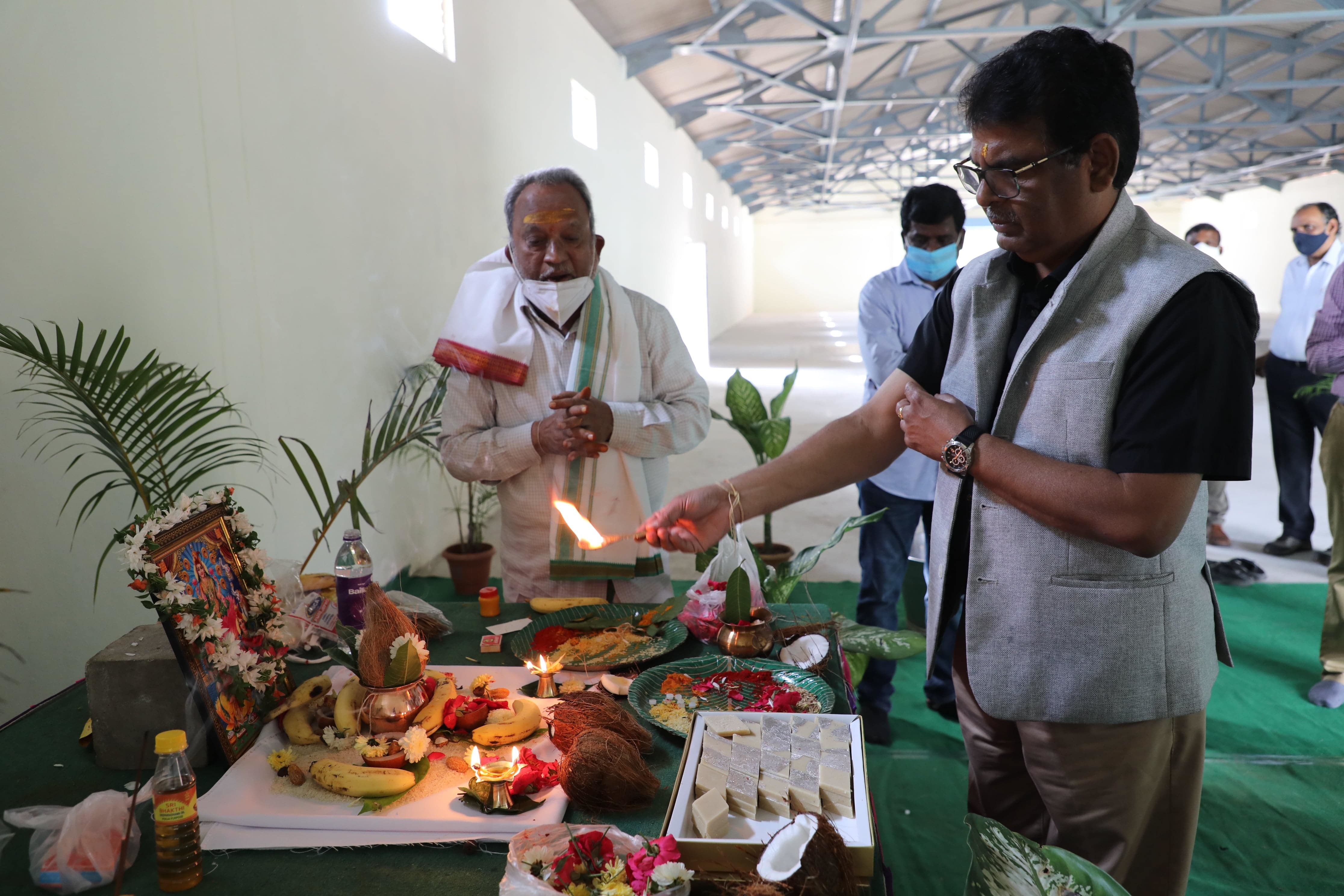 CE, NFC performing Vastu Pooja.
